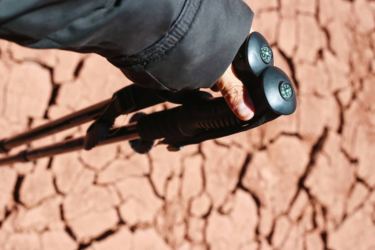 Close-up of rope cam cleats for climbing sticks mounted on aluminum poles with dynamic rope threaded through