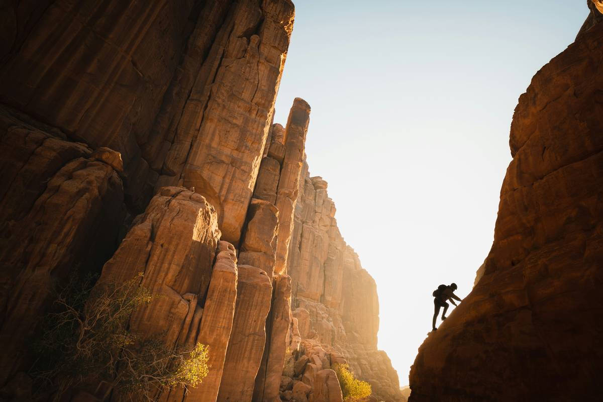 Rock Climbing gear setup showing tricams placed in a granite crack